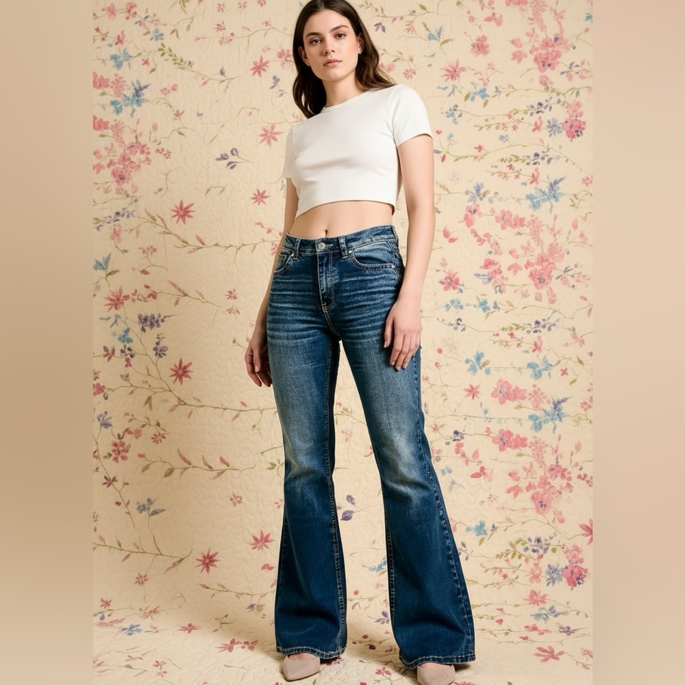 Stretchy flare distressed jeans with embroidered pockets